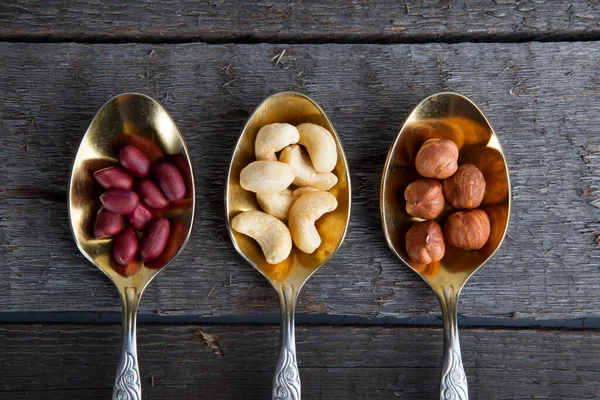 Mixed Nuts Metal Spoon Wooden Table Rustic Style — Stock Photo, Image