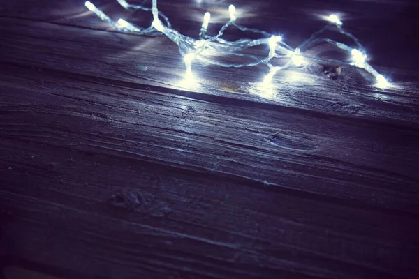 Vánoční Světla Pozadí Dřevěnou Hnědou Rustikální Podlahou — Stock fotografie
