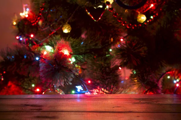 Vánoční Dovolená Pozadí Prázdným Dřevěným Palubním Stolem Přes Slavnostní Bokeh — Stock fotografie
