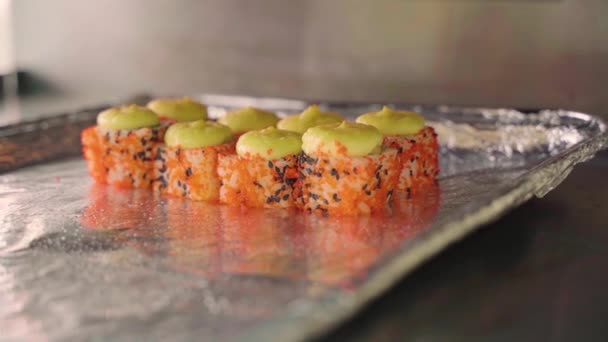 Sushi rolls are baked in the oven — Stock Video