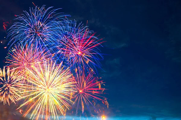 Fireworks on the background of the dark night sky. 4th July - American Independence Day — Stock Photo, Image