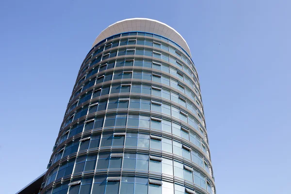 Futuristic building set against a blue sky