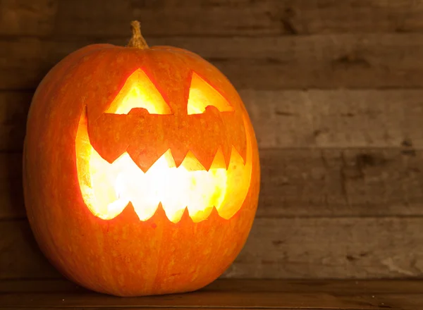 Illuminated halloween pumpkin — Stock Photo, Image