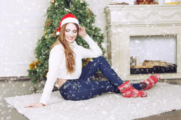 Young woman fashion model with Santa Claus clothing — Stock Photo, Image