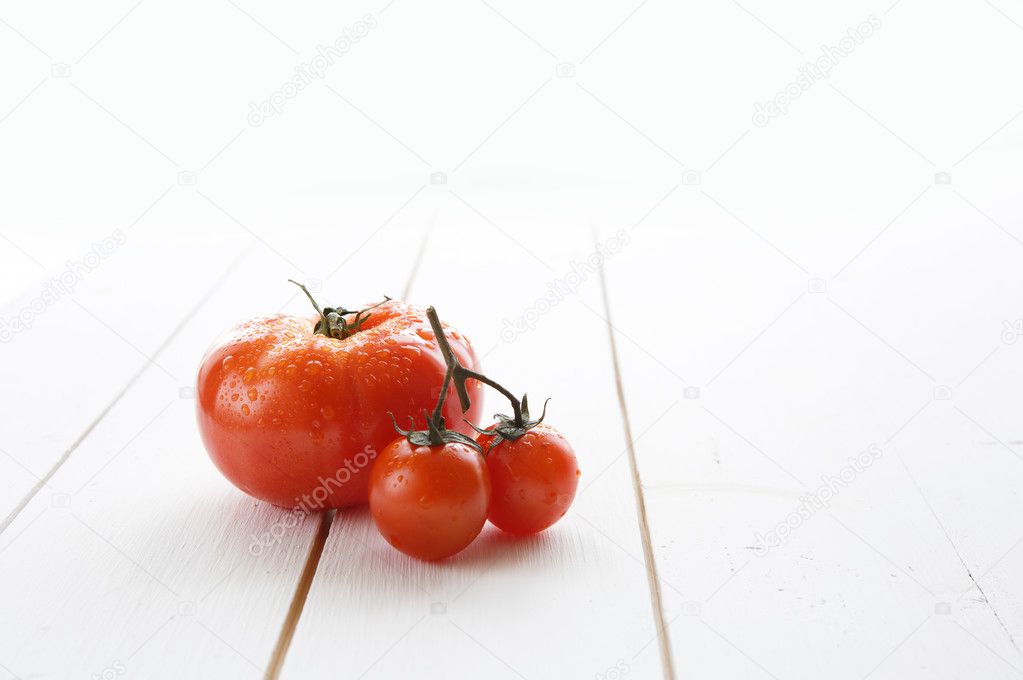 Tomatoes  on a white background.