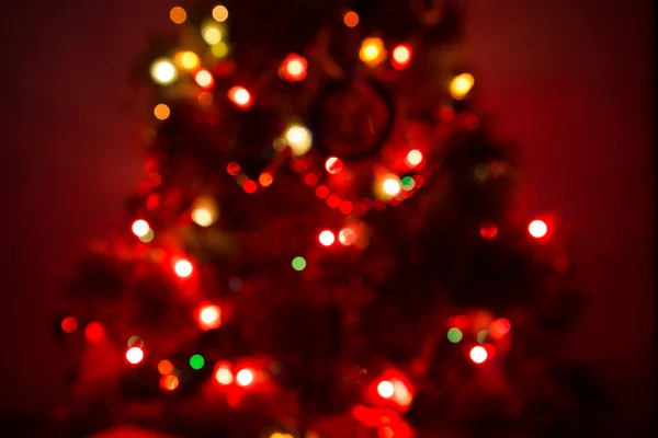Kerstboom maken een prachtige bokeh van lichten — Stockfoto