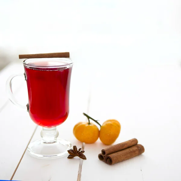 Mulled wine in glass with cinnamon stick isolated — Stock Photo, Image