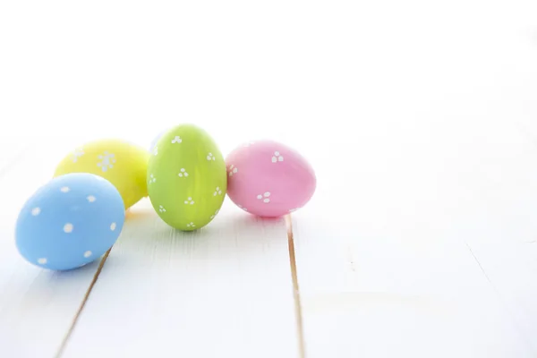 Easter eggs on wooden background