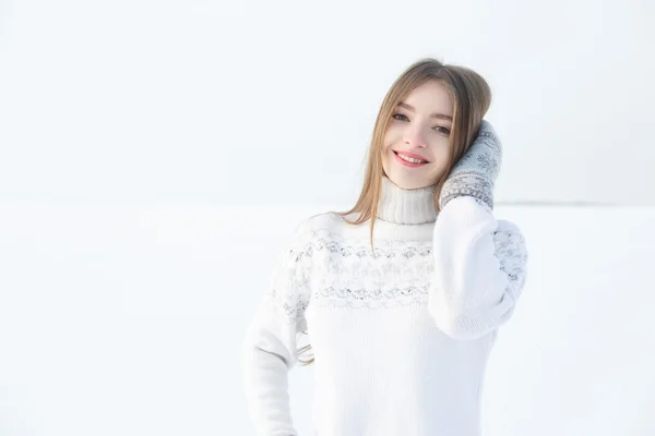 Outdoor portrait of girl on white warm sweater — Stock Photo, Image