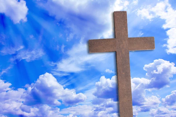 The Cross of Jesus Christ and beautiful clouds Stock Picture