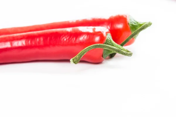 Chili pepper na světlém pozadí, makro snímek — Stock fotografie