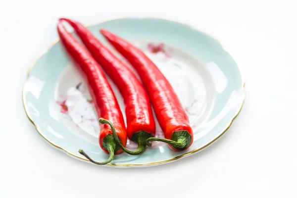 Chili pepper na světlém pozadí, makro snímek — Stock fotografie