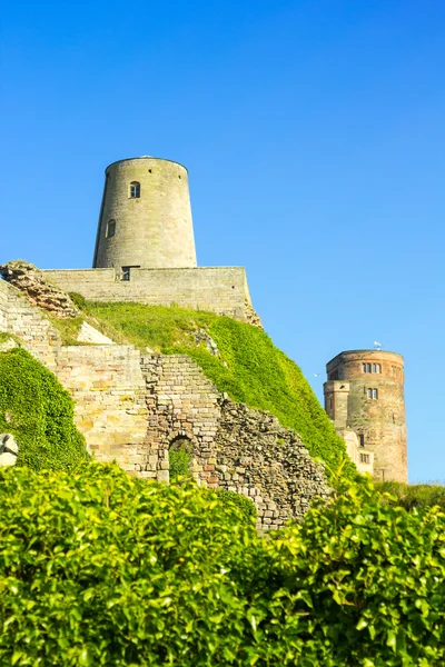 Bamburgh slott, vid kusten i Bamburgh, Northumberland, England, i — Stockfoto