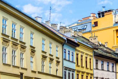 The old, historical tenements at the Old Market Square in Cracow, Poland clipart