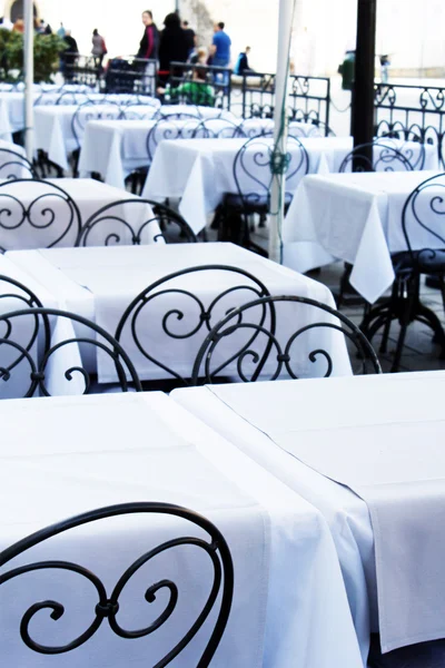 Stylish metal chair and tables at the restaurant — Stock Image Stylish metal chair and tables at the restaurant Stock Image