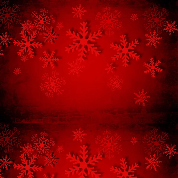 Fondo rojo de Navidad con copos de nieve. — Foto de Stock