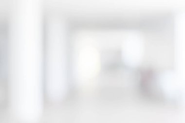 Modern beyaz ofis binasının giriş kapısı bulanık arka planı olan boş beyaz koridor koridoru