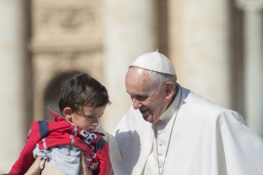 Pope Francis greets little boy clipart