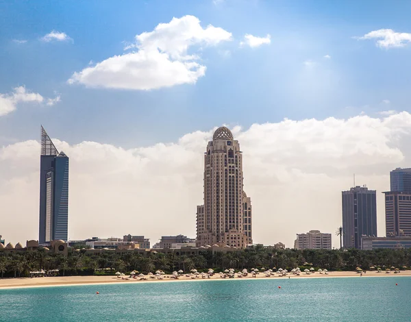 High blue building skyscraper, bay ocean — Stock Photo, Image