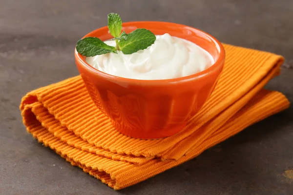 Natural organic sour cream in orange bowl — Stock Photo, Image