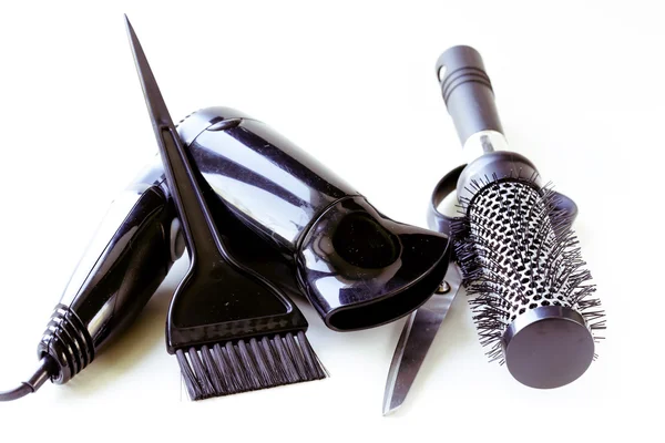 Tools for hairdresser (hair dryers, scissors, combs) — Stock Photo, Image