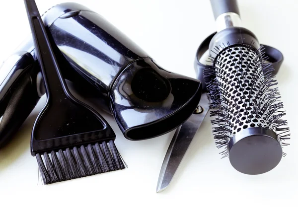 Tools for hairdresser (hair dryers, scissors, combs) — Stock Photo, Image