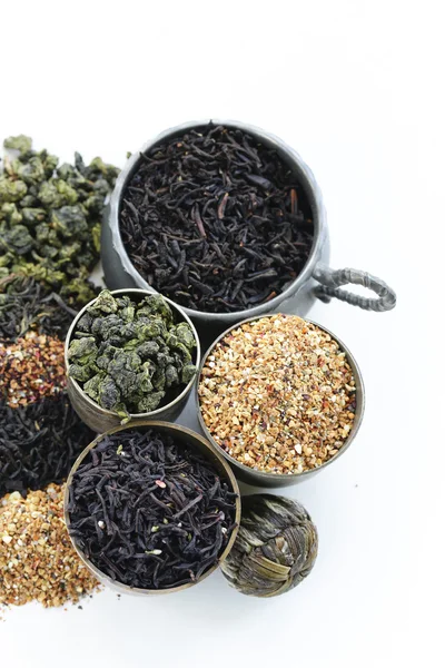 Different varieties of dry tea (black, white, green) — Stock Photo, Image