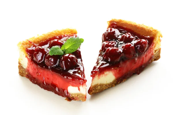 Piece of cherry cheesecake and leaves of fresh mint — Stock Photo, Image