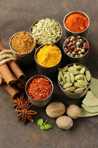 Variety of spices (saffron, paprika, pepper, fennel, cinnamon, turmeric, nutmeg) — Stock Photo, Image