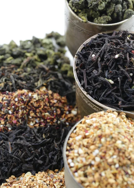 Different varieties of dry tea (black, white, green) — Stock Photo, Image