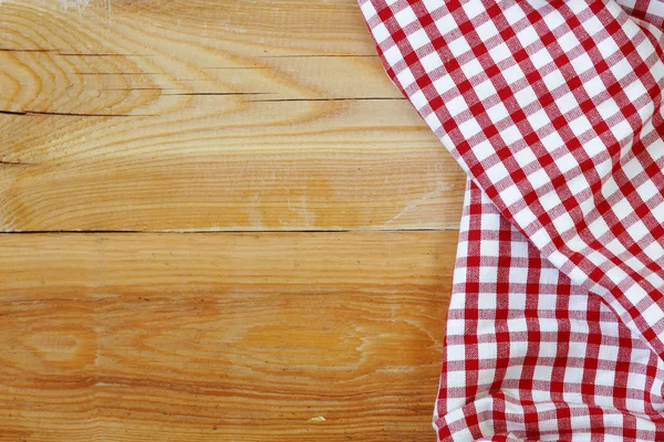 Fundo doméstico de madeira com toalha de cozinha quadriculada, guardanapo — Fotografia de Stock