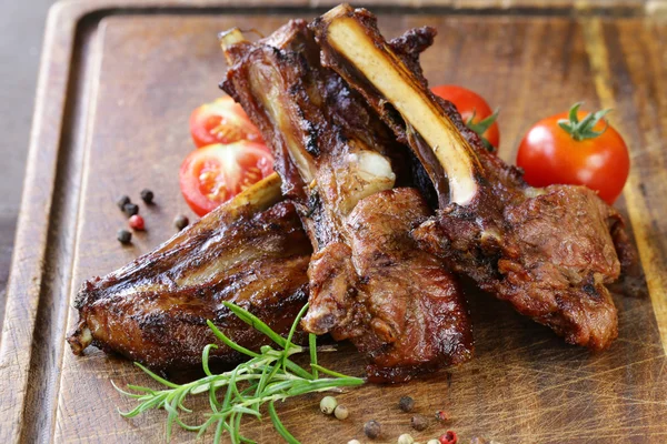 Grilled lamb chops steak with pepper and rosemary — Stock Photo, Image