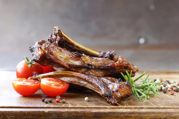 Grilled lamb chops steak with pepper and rosemary — Stock Photo, Image