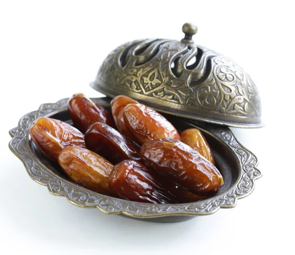 Sweet dried dates in vintage silver plate — Stock Photo, Image