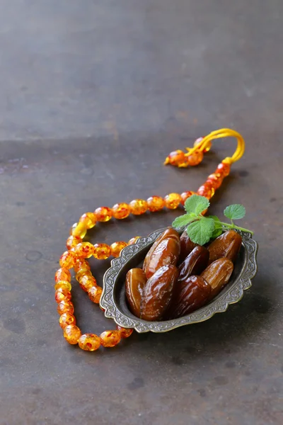 Sweet dried dates in vintage silver plate — Stock Photo, Image