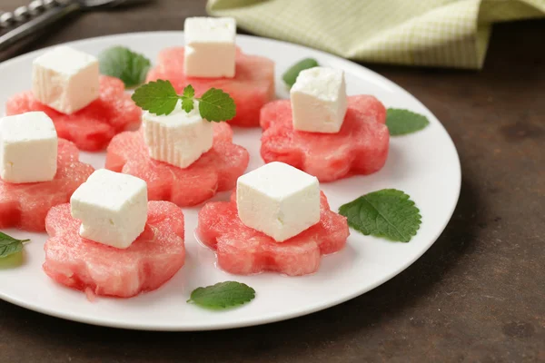 Delicacy summer appetizer - sweet watermelon with salty soft cheese — Stock Photo, Image