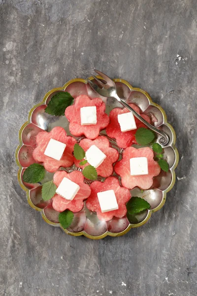 Delicacy summer appetizer - sweet watermelon with salty soft cheese — Stock Photo, Image