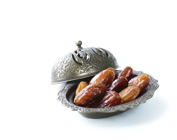 Sweet dried dates in vintage silver plate — Stock Photo, Image