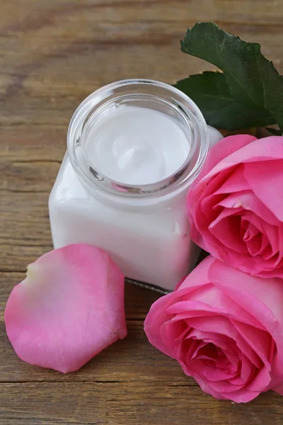 Natural organic cosmetics cream and rose water — Stock Photo, Image