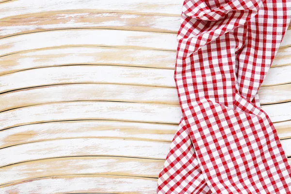 Wooden domestic background with checkered kitchen towel, napkin — Stock Photo, Image