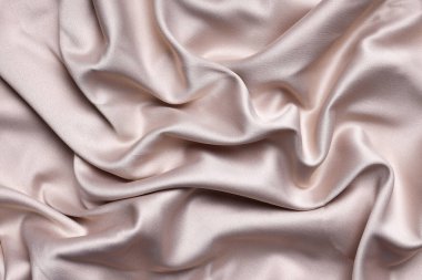 Altın ve şampanyanın ipek arka plan rengi