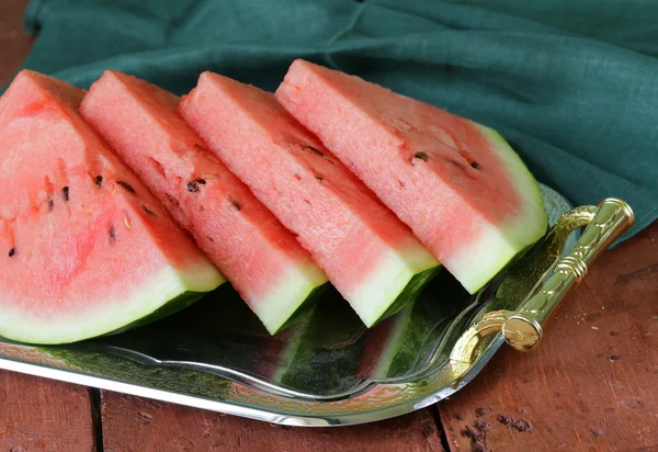 Fresh sweet watermelon on a metal tray — Stock Photo, Image