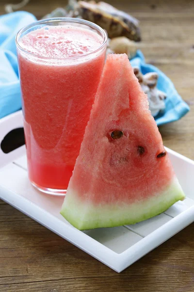 Fresh sweet watermelon smoothie on a wooden table — Stock Photo, Image