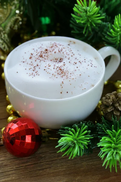 Festive drink (chocolate, cocoa, coffee) with milk foam, Christmas Still Life