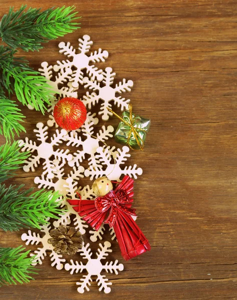 Decorazioni di sfondo di Natale e fiocchi di neve in legno — Foto Stock