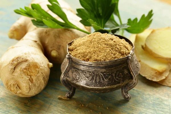 Ground and fresh ginger traditional oriental spice — Stock Photo, Image