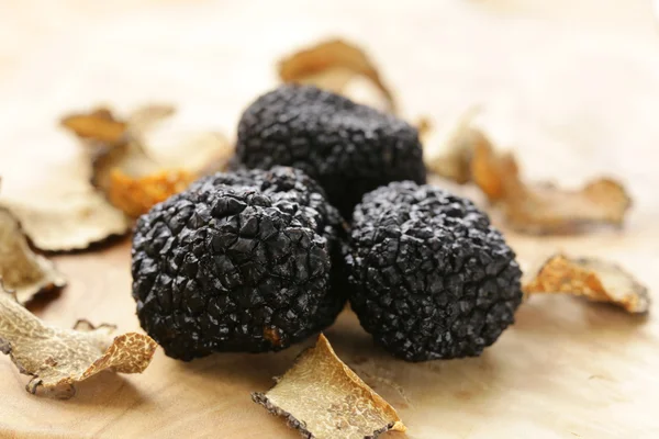 Драгоценный черный трюфельный гриб - изысканный овощ Стоковая Картинка