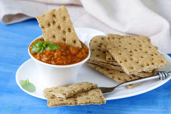 Vegetable ragout dip from eggplant and tomato with crisps — Stock Photo, Image