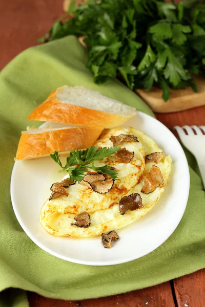 Gourmet omelette with black truffle and herbs — Stock Photo, Image