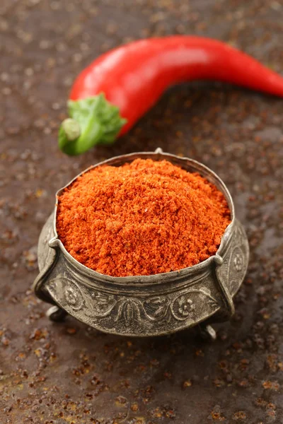 Red spice paprika pepper on iron old background — Stock Photo, Image